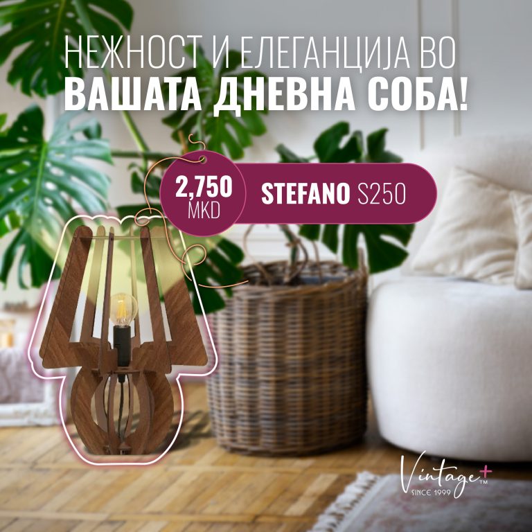 Wooden table lamp with exposed bulb next to a wicker basket and plant in a cozy living room setting.